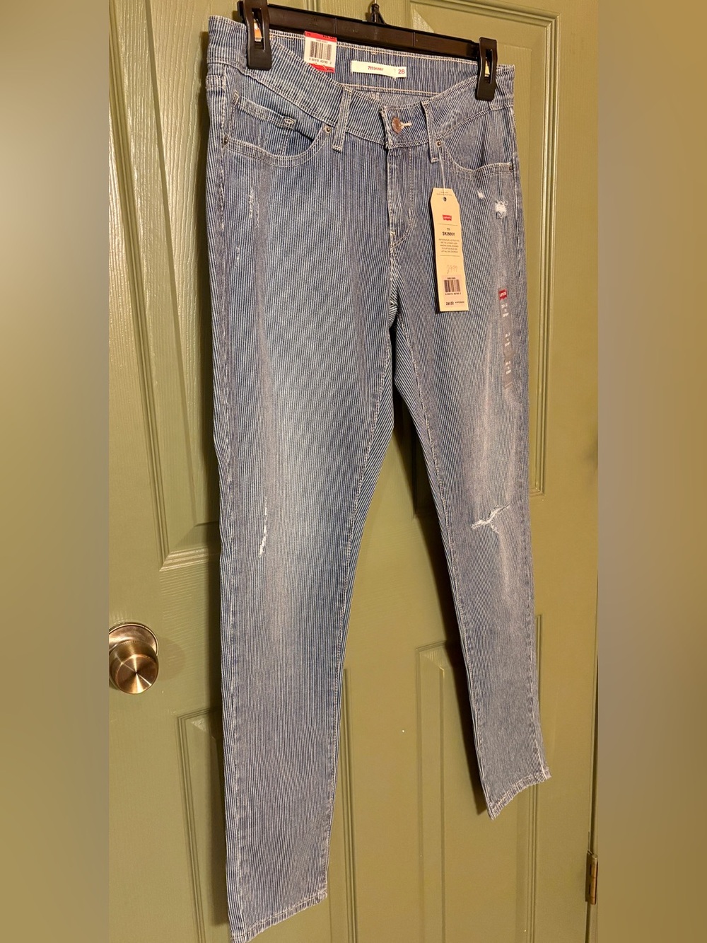 Levi's Women's Engineer Stripe Light Wash Skinny Jeans with Subtle Distressing
